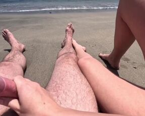 found a guy on a public beach and decided to jerk him off