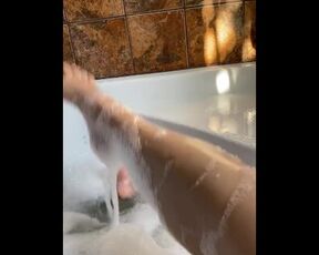 Soapy feet playing with my dildo