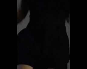 Pretty girl stripping in a new dress