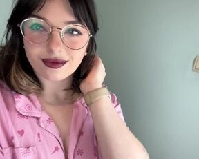 Beautiful brunette blows a kiss on camera